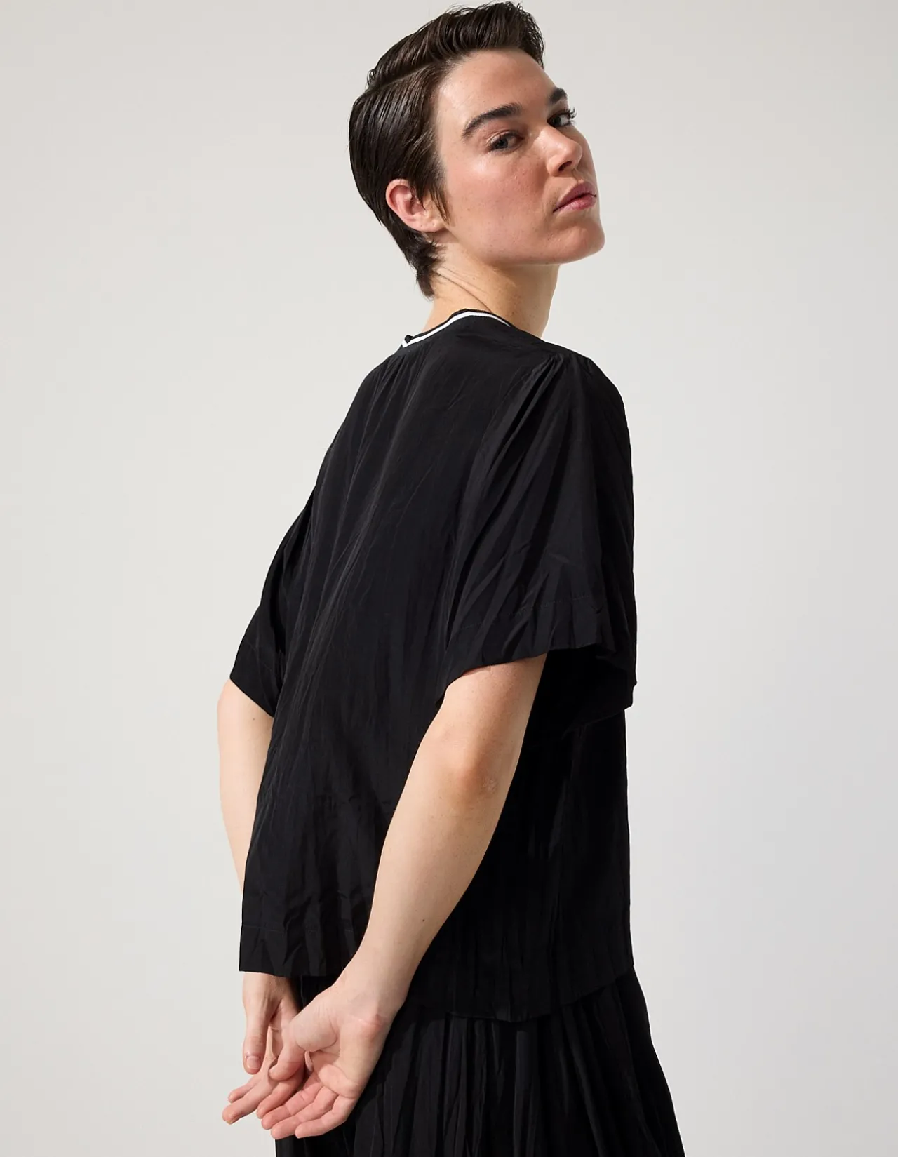 CRUSHED TRAVEL TOP