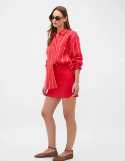 LINEN CURVE HEM MINI SKIRT