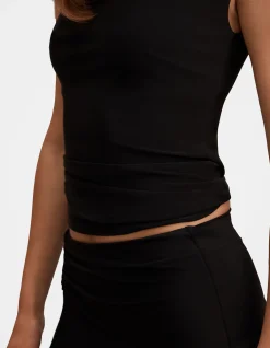 LOGAN ASYMMETRIC SHOULDER TOP