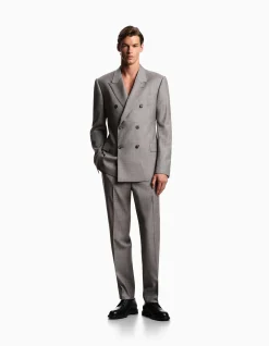 MAN'S DOUBLE BREASTED WOOL SUIT WITH SHARP PEAK LAPEL