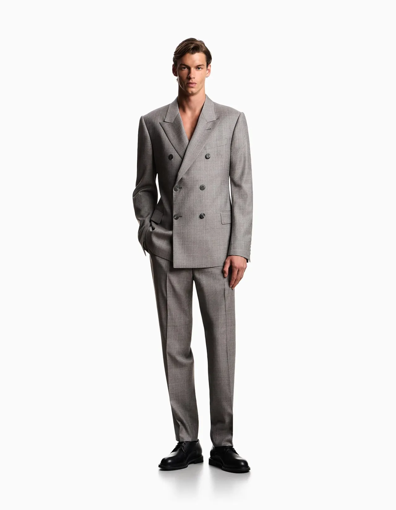 MAN'S DOUBLE BREASTED WOOL SUIT WITH SHARP PEAK LAPEL