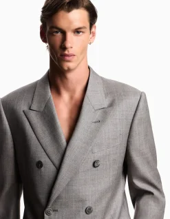 MAN'S DOUBLE BREASTED WOOL SUIT WITH SHARP PEAK LAPEL