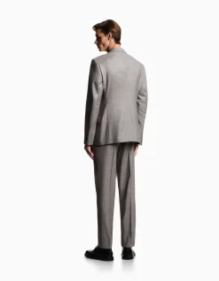MAN'S DOUBLE BREASTED WOOL SUIT WITH SHARP PEAK LAPEL