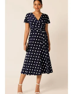 REVERSE WRAP MIDI DRESS IN NAVY SPOT
