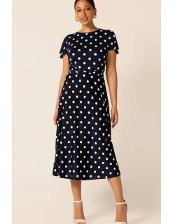 REVERSE WRAP MIDI DRESS IN NAVY SPOT
