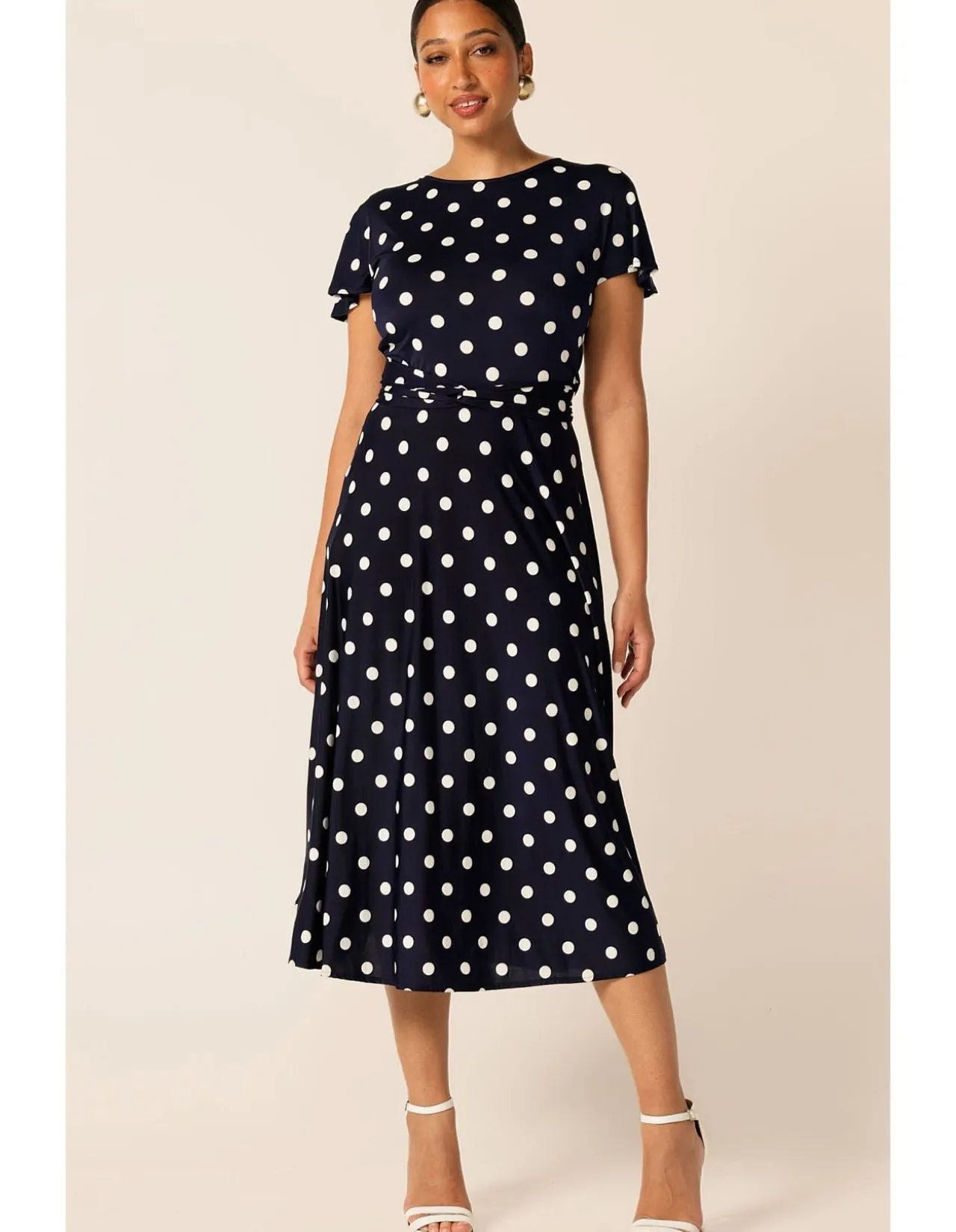 REVERSE WRAP MIDI DRESS IN NAVY SPOT
