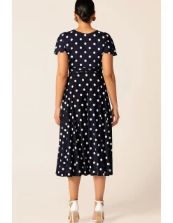 REVERSE WRAP MIDI DRESS IN NAVY SPOT