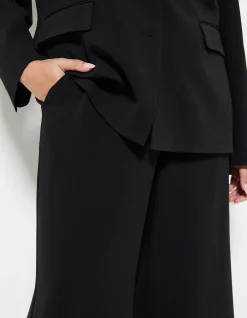 THE DRAPED LEG CREPE TROUSER