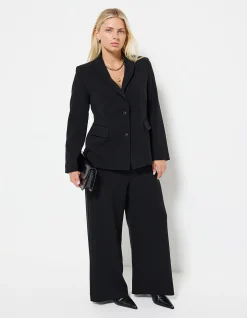 THE DRAPED LEG CREPE TROUSER