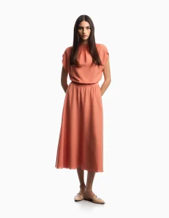 WOMAN'S KNITTED DRESS WITH YOKE AND CAP SLEEVES