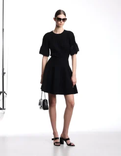 WOMAN'S RIBBED KNITWEAR WITH PLEATED SLEEVES